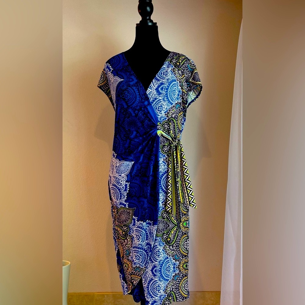 Figure flattering wrap dress.